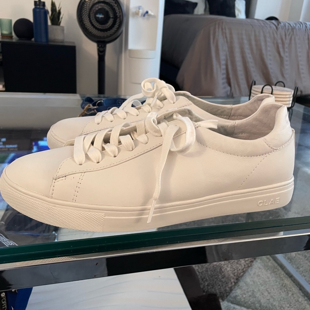 White clae mens sneakers. Never worn.